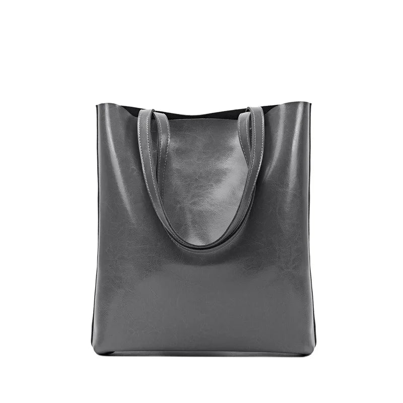 Sac élégant femme en cuir fendu, accessoire de mode intemporel, pour un look chic et raffiné.