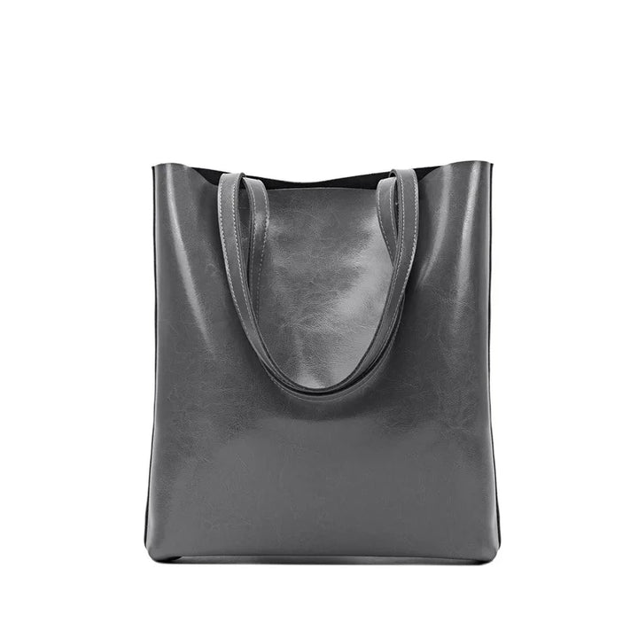 Sac élégant femme en cuir fendu, accessoire de mode intemporel, pour un look chic et raffiné.