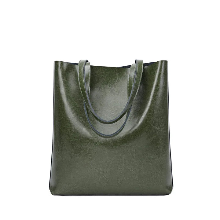 Sac à main femme pratique pour le quotidien, en cuir fendu résistant et au design moderne.