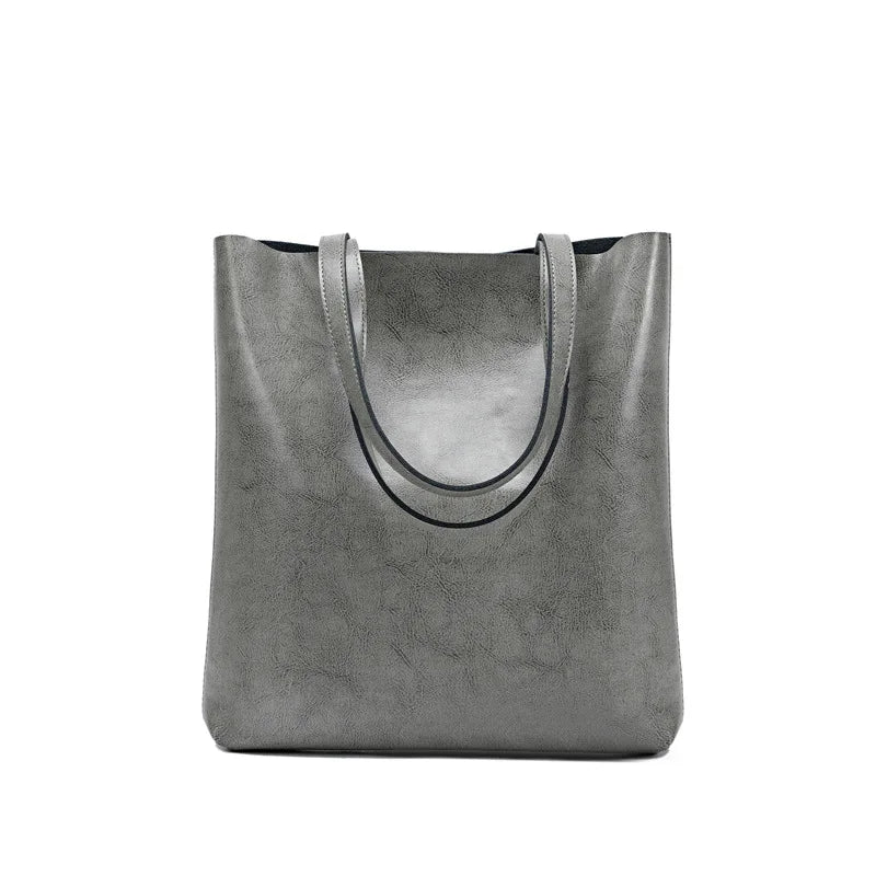 Sac à main femme en cuir fendu multicolore, un accessoire de mode élégant et polyvalent.