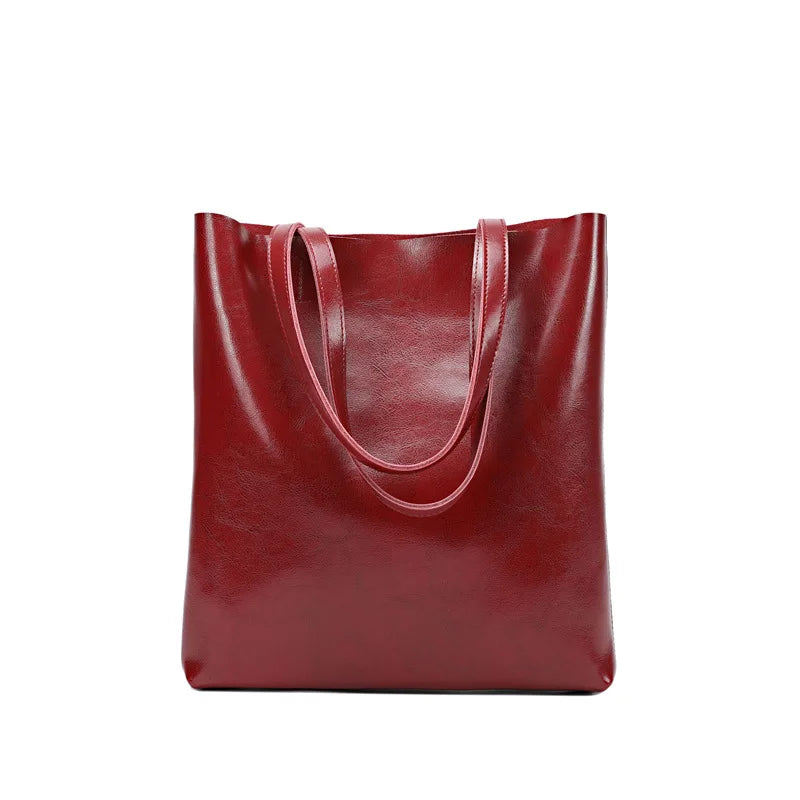 Sac porté épaule femme en cuir fendu, design élégant et spacieux, parfait pour le travail ou loisirs.