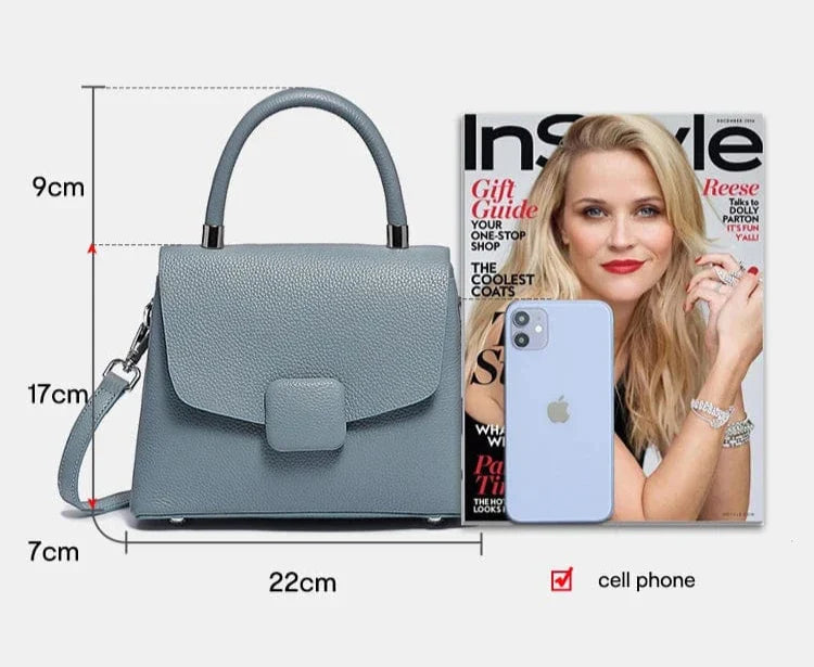 Sac bandoulière femme en cuir noir, design épuré, un accessoire polyvalent pour le quotidien.