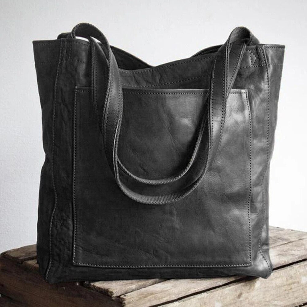 Sac épaule femme en cuir doux café, design moderne et organisé, parfait pour un usage quotidien.