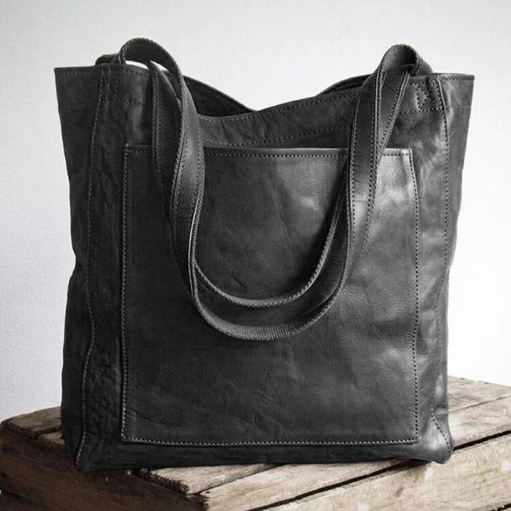 Sac épaule femme en cuir doux café, design moderne et organisé, parfait pour un usage quotidien.
