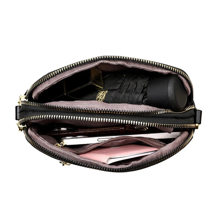 Sac à main femme en cuir vegan, couleur taupe, accessoire polyvalent et élégant, avec bandoulière.