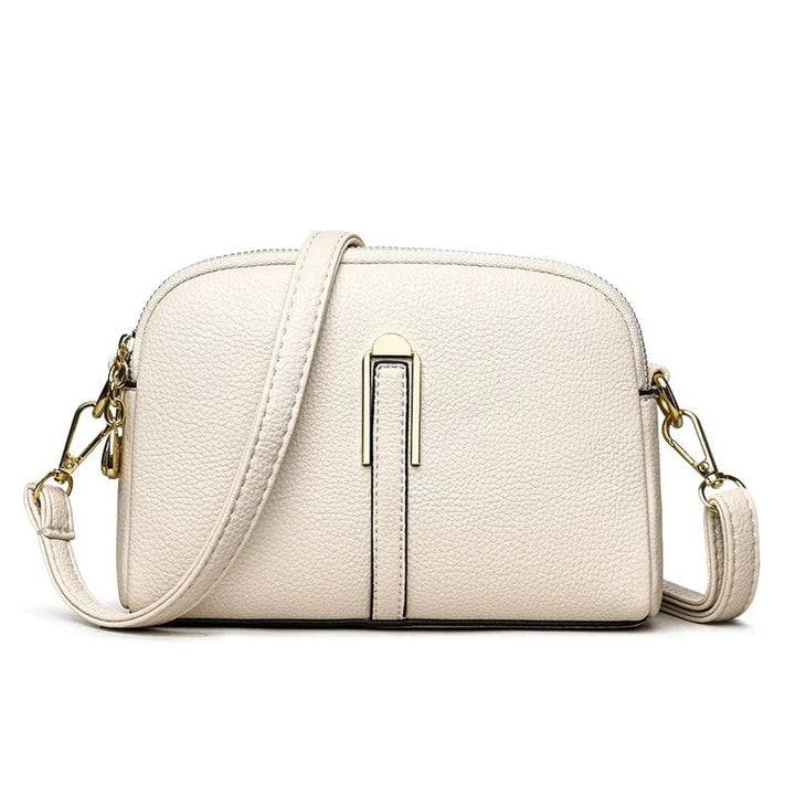 Sac femme en cuir vegan avec bandoulière réglable, style tendance, idéal pour toute occasion.