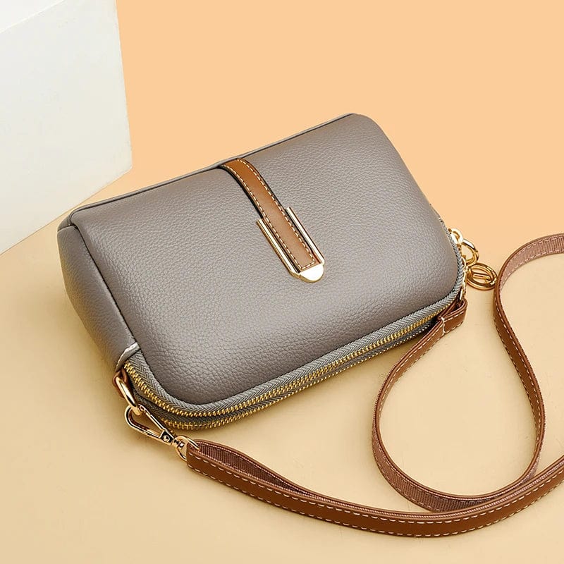 Sac femme en cuir vegan deux tons (noir et blanc), un design contemporain et chic.