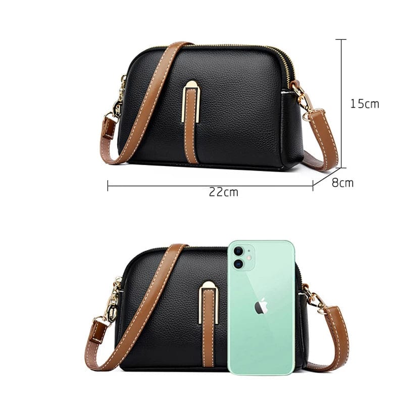 Sac à main cuir vegan bleu marine, forme structurée, élégant pour le bureau ou les sorties.