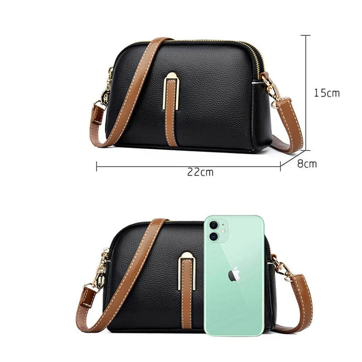 Sac à main cuir vegan bleu marine, forme structurée, élégant pour le bureau ou les sorties.