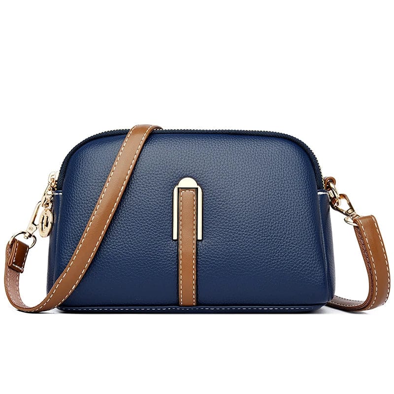 Sac femme en cuir vegan métallisé argent, un accessoire mode audacieux et chic.