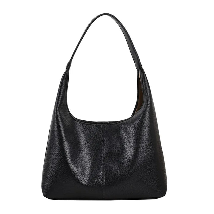 Sac femme en similicuir vieilli, accessoire mode pratique à porter à l'épaule.