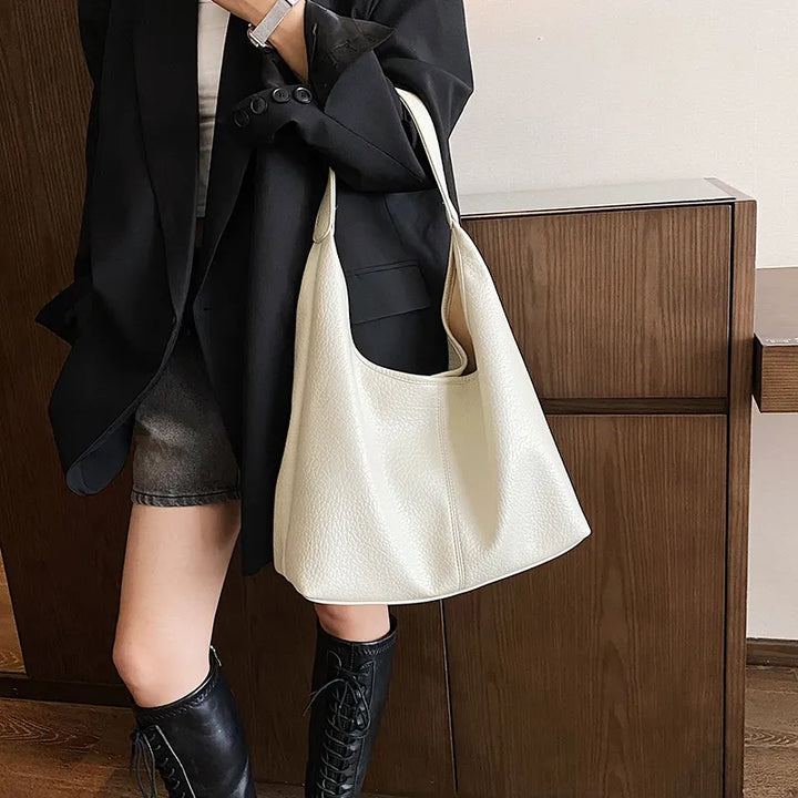 Sac à main femme en cuir vieilli, style hobo, élégant pour la mode quotidienne.