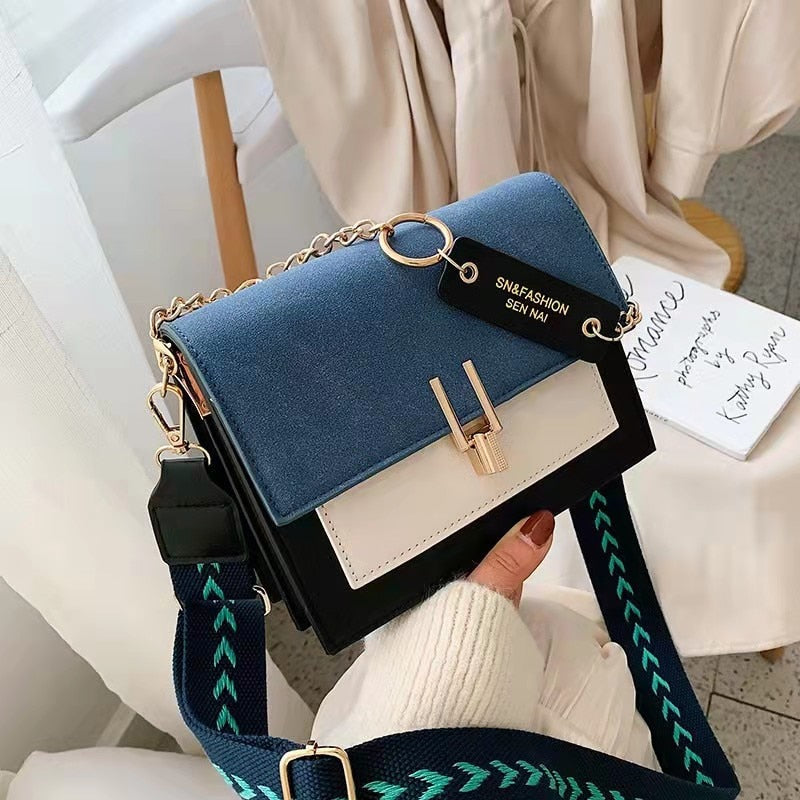 Sac à main femme élégant en nubuck noir, avec anse unique et bandoulière amovible, idéal pour accessoire chic de soirée