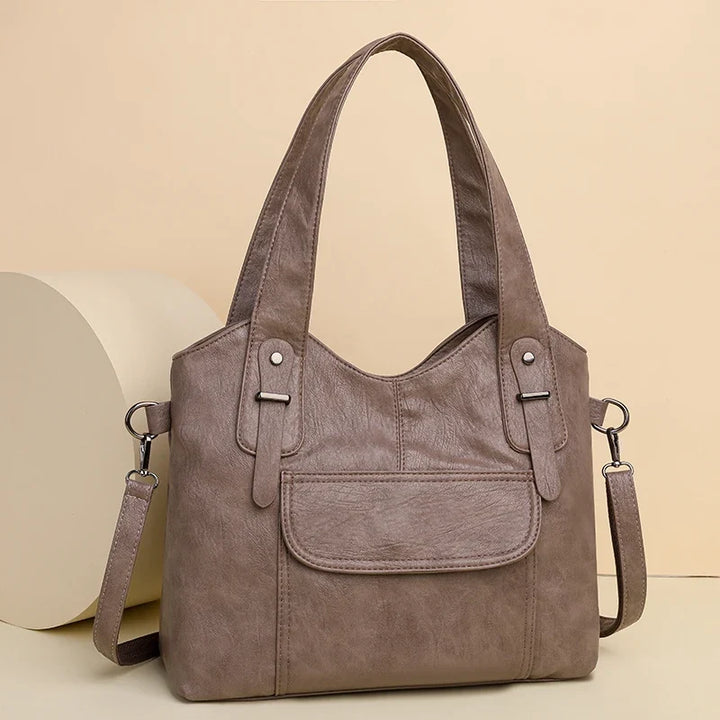 Sac à main bordeaux en simili cuir, idéal comme sac bandoulière ou épaule, très chic.
