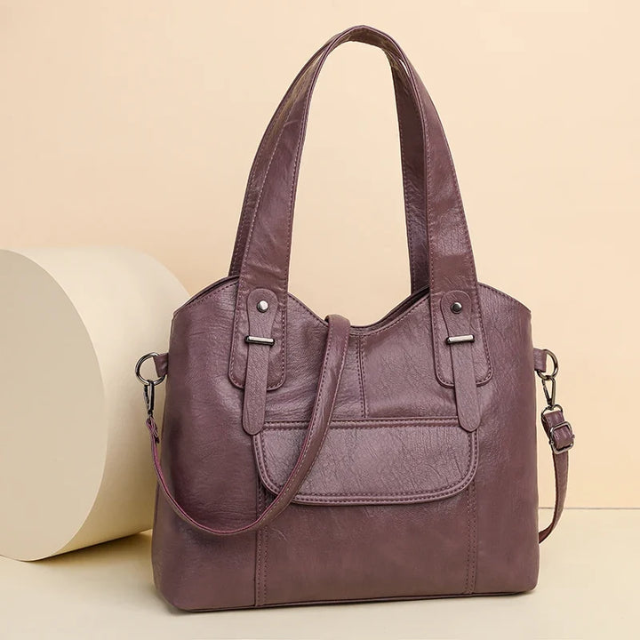 Sac femme élégant en simili cuir gris, polyvalent, parfait pour usage quotidien.
