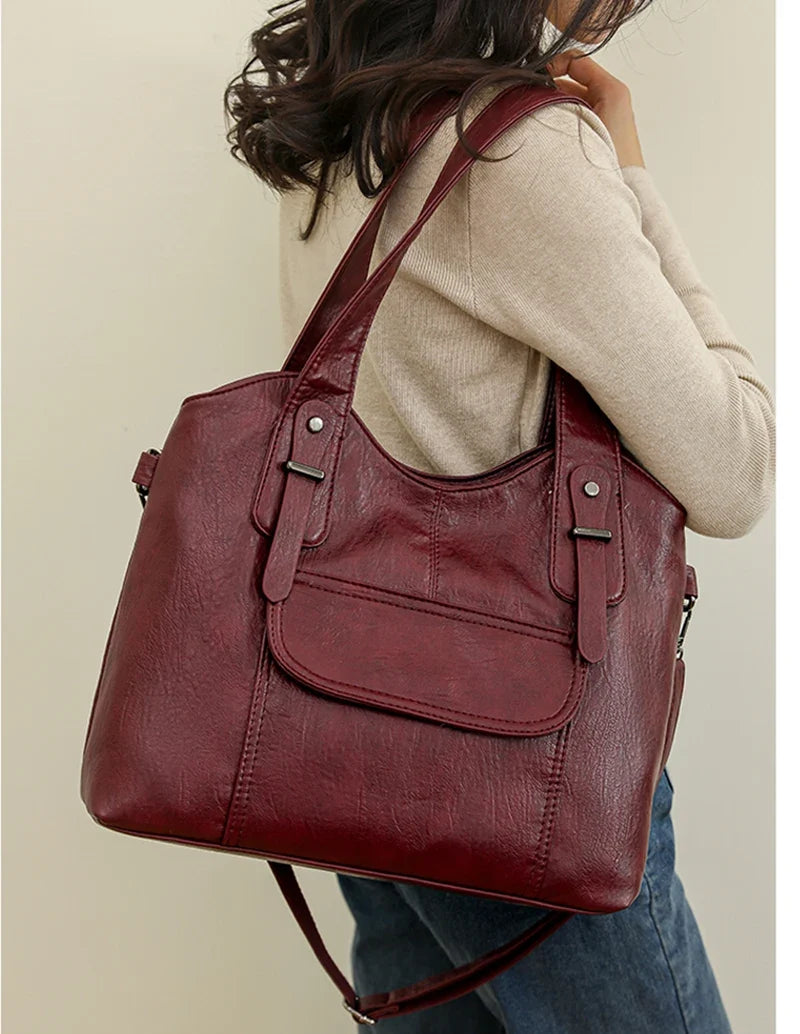 Sac à main bleu marine en simili cuir, élégant et chic pour femme.