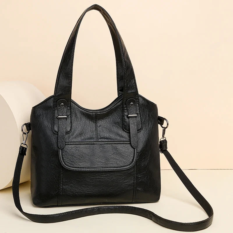 Sac femme violet en simili cuir, chic et pratique, idéal pour toute occasion.