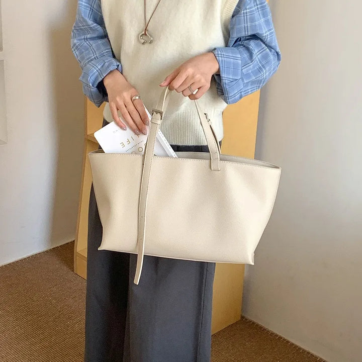 Sac à main femme chic en similicuir texturé, idéal pour un style élégant et polyvalent.