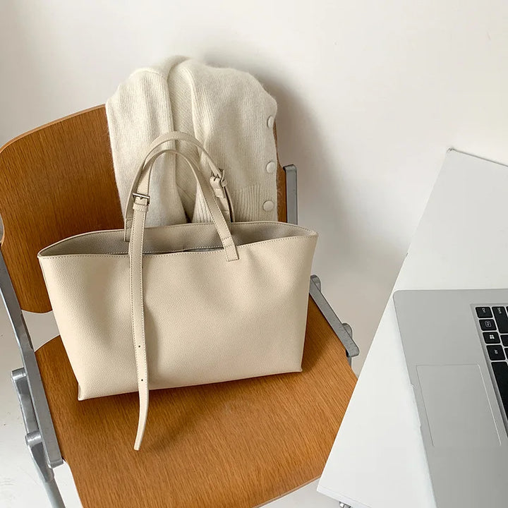 Sac à main femme polyvalent en similicuir texturé, style élégant et moderne, parfait pour organiser vos affaires.
