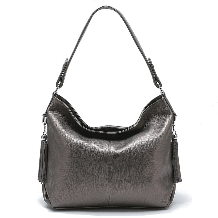 Sac femme de qualité, grand et élégant. En cuir synthétique robuste, idéal pour un usage quotidien polyvalent.