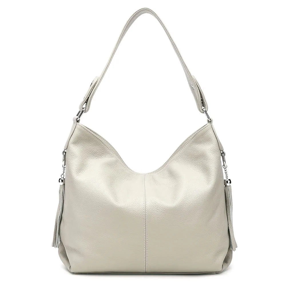 Sac femme grand format, porté main, épaule ou bandoulière. Cuir synthétique, élégant et fonctionnel.