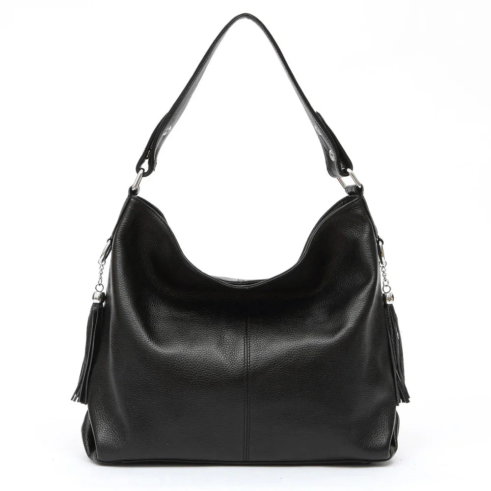 Grand sac épaule femme pratique, porté bandoulière. En cuir synthétique pour une organisation optimale.