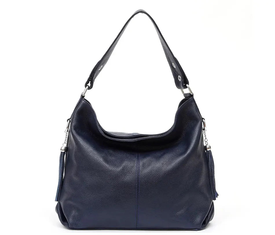 Sac femme chic et polyvalent, grand modèle en cuir synthétique. Un accessoire mode élégant pour toute occasion.
