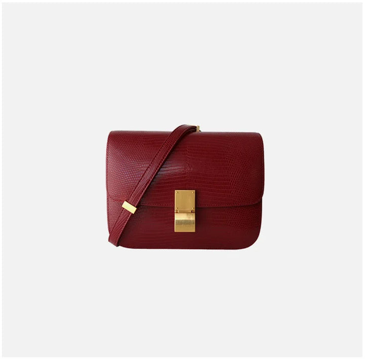 Base stable et résistante du sac à main femme croco, pour une durabilité accrue.
