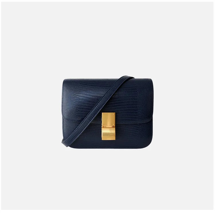 Sac à main femme croco noir élégant, un accessoire mode intemporel et luxueux.