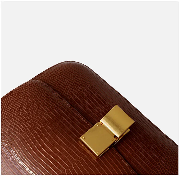 Intérieur organisé du sac femme croco, avec plusieurs compartiments pratiques.