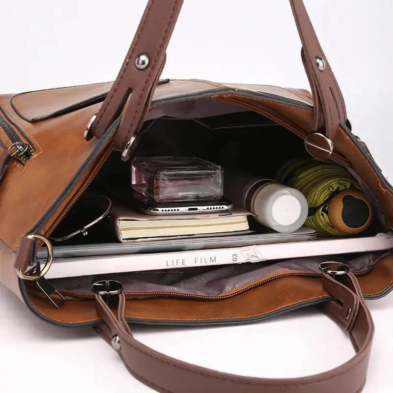 Sac à main gris tendance pour femme, design moderne, élégant et pratique pour le quotidien.