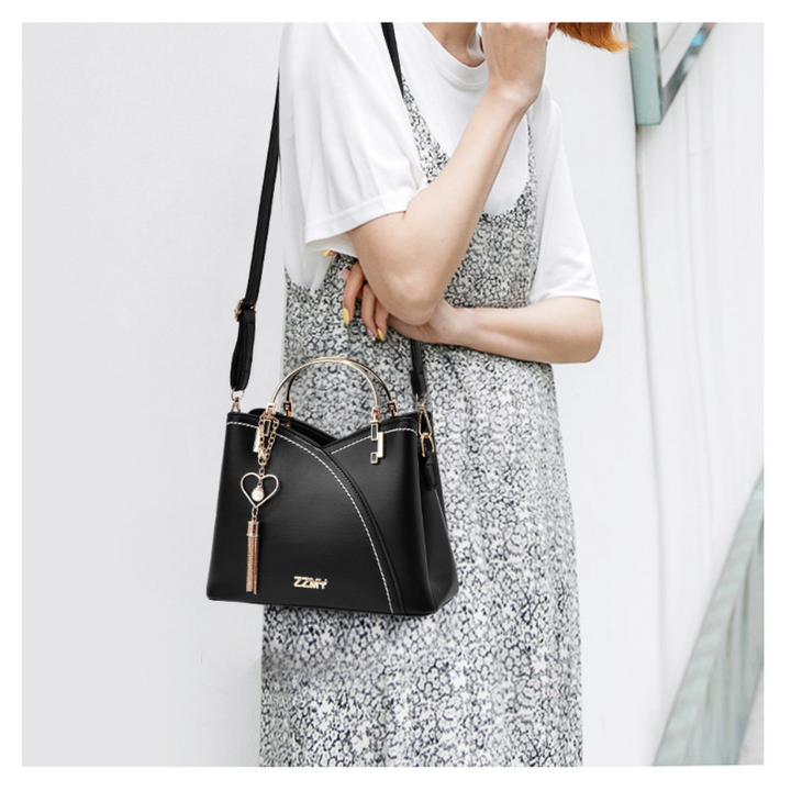 Sac à bandoulière polyvalent pour femme, idéal pour le quotidien, alliant style et praticité.
