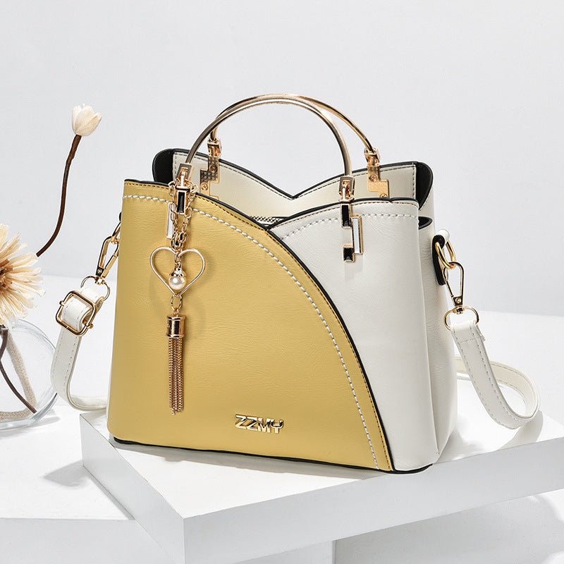 Sac à main femme tendance et polyvalent, parfait pour le travail ou les sorties. Un accessoire de mode incontournable.