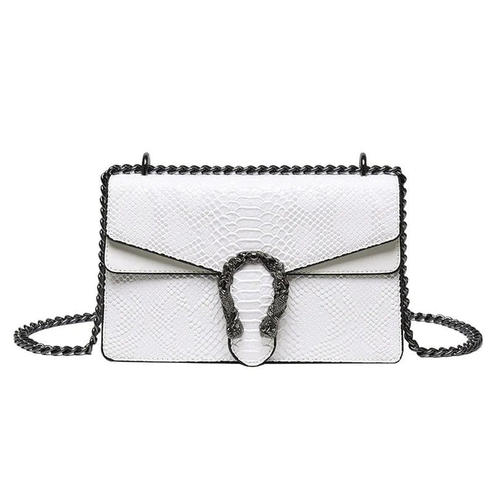 Accessoire femme: sac à main en cuir PU brun avec anse et bandoulière amovible, chic et pratique.