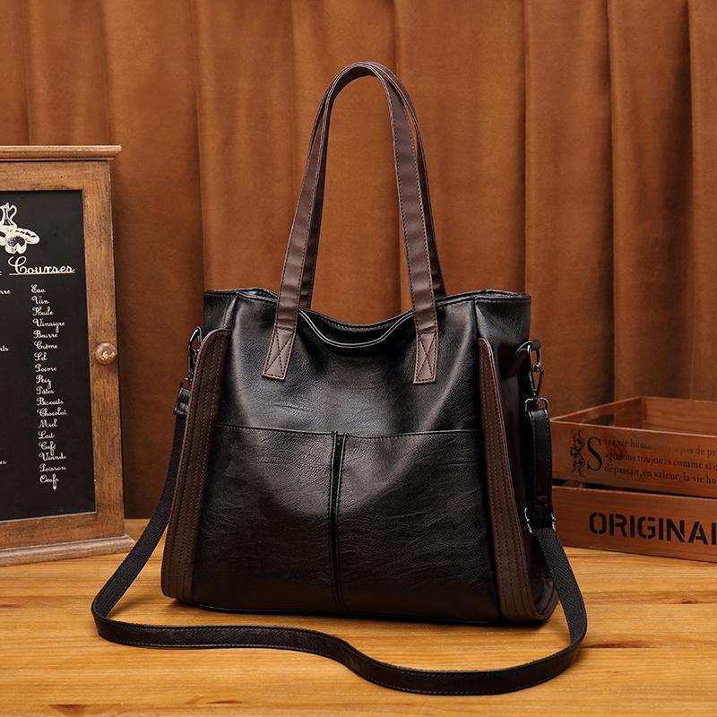 Sac à main femme noir, spacieux et élégant, idéal pour accessoire chic.