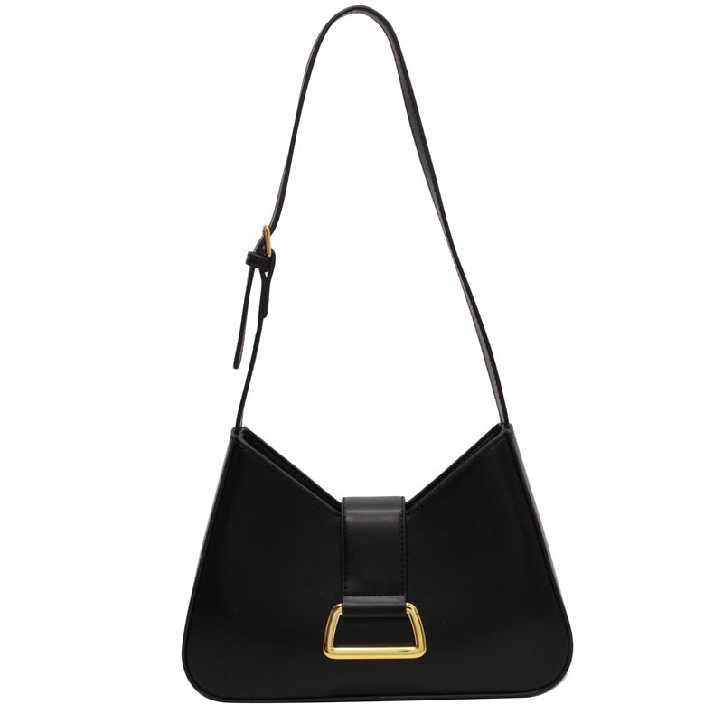 Élégant sac à main noir en cuir lisse pour femme. Parfait pour un look chic et sophistiqué au quotidien.