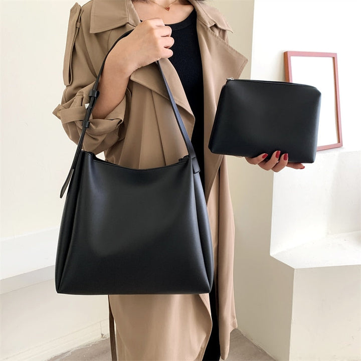 Pochette sac à main noire chic pour femme, design élégant avec bandoulière, parfait quotidien
