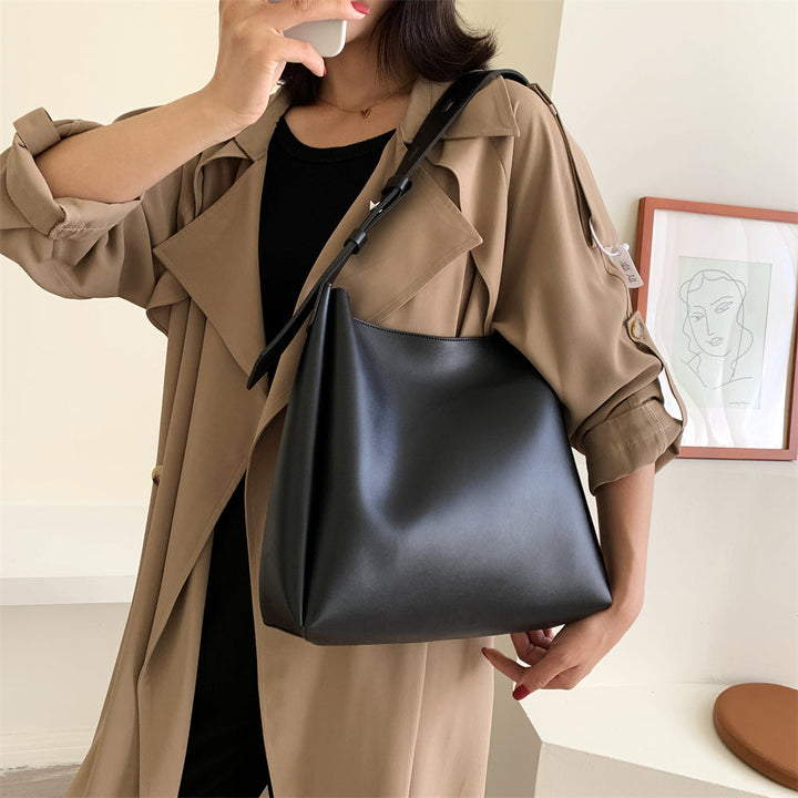 Sac à main élégant noir en similicuir pour femme, accessoire chic pour toute occasion, pochette