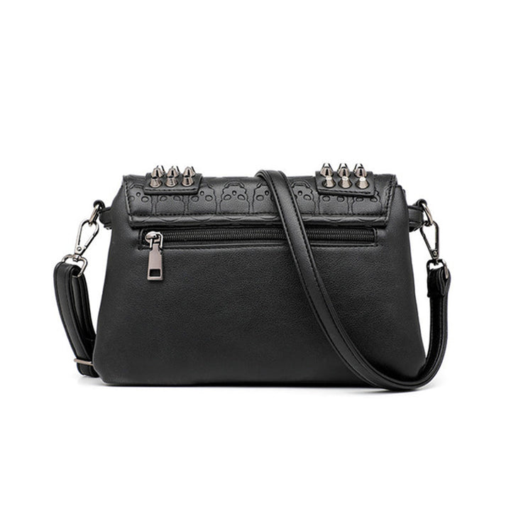 Sac bandoulière femme noir style rock, en similicuir, idéal pour accessoire de mode audacieux.
