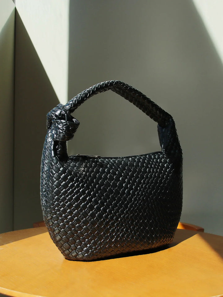 Sac rond tressé noir pour femme en similicuir, élégant et pratique pour le quotidien, avec bandoulière.