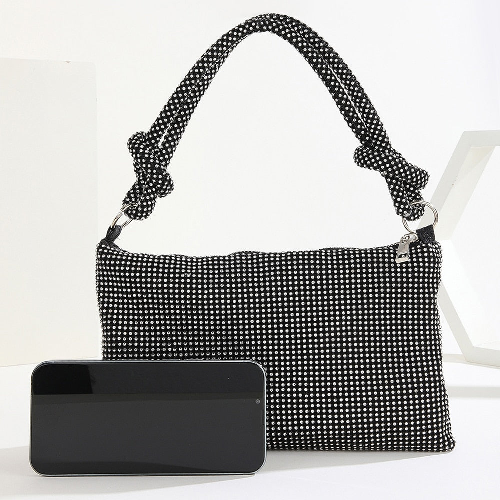 Pochette de soirée noire scintillante pour femme, accessoire de mode chic et tendance avec paillettes.