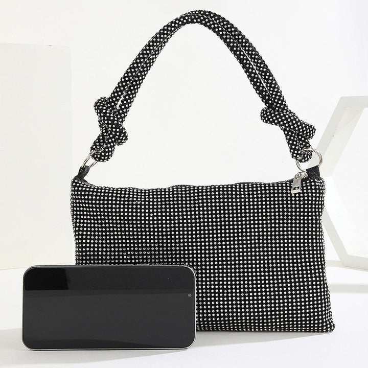 Pochette de soirée noire scintillante pour femme, accessoire de mode chic et tendance avec paillettes.