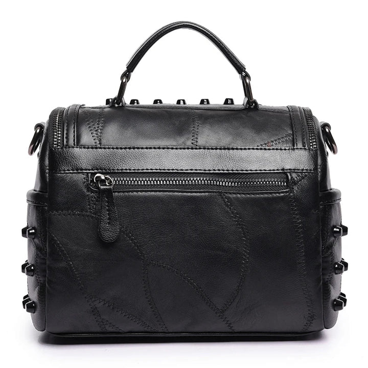 Sac à main femme noir rock et élégant en cuir synthétique, bandoulière réglable, parfait pour accessoire
