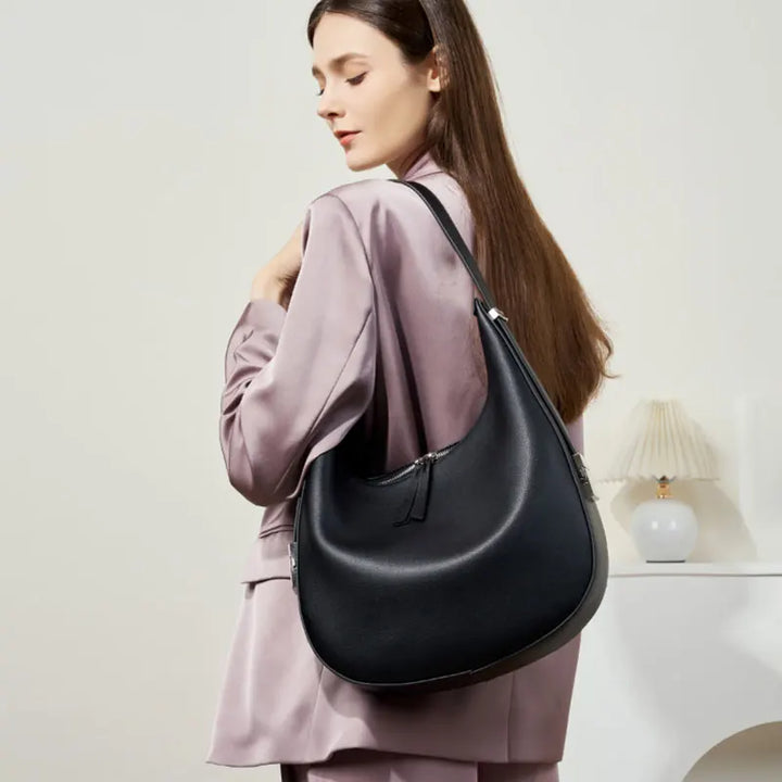 Sac à main hobo en cuir femme, chic et élégant, parfait pour le quotidien.
