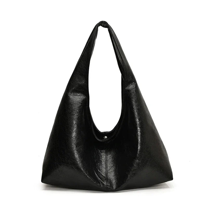 Sac hobo femme, style décontracté élégant. En similicuir, accessoire mode tendance pour un look moderne et frais.