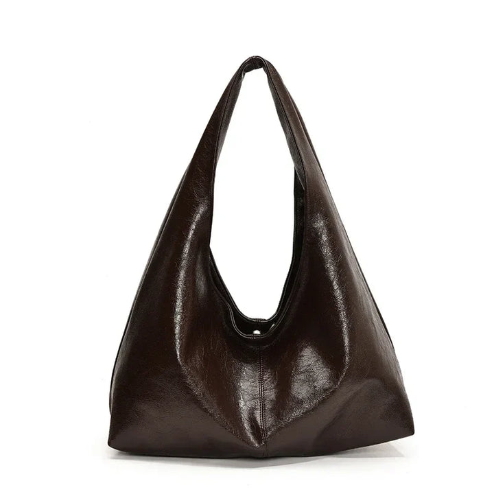 Sac à main hobo chic pour femmes. Similicuir de haute qualité, accessoire mode essentiel pour un style sophistiqué.