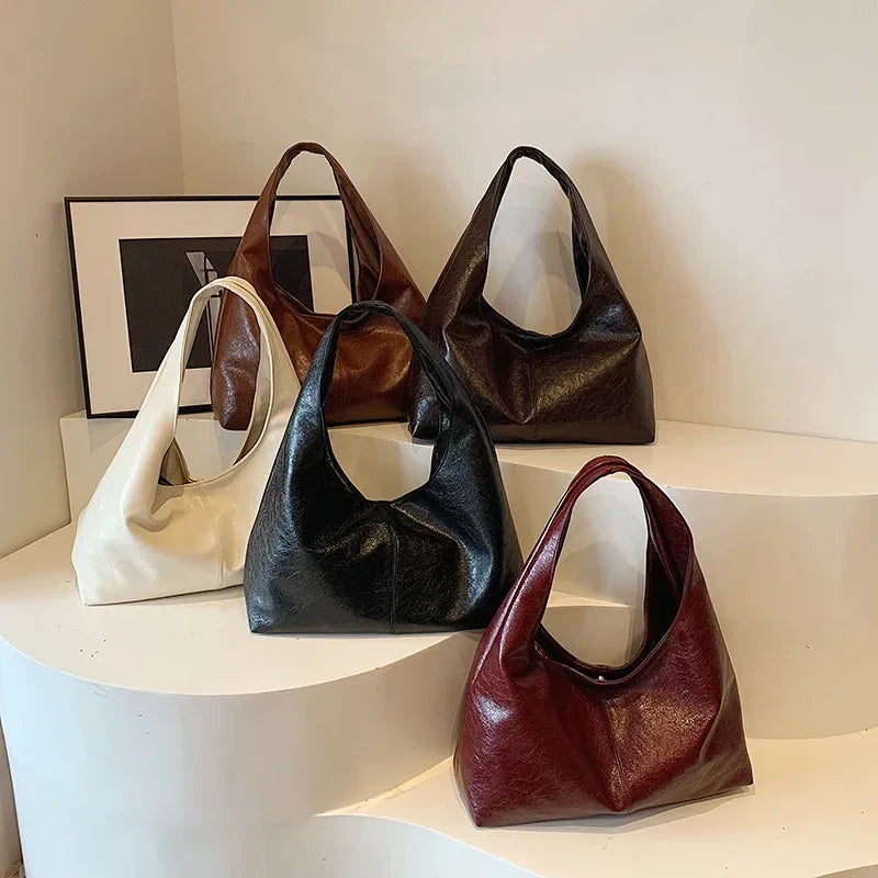 Grand sac à main épaule hobo pour femmes. En similicuir de qualité, accessoire mode chic et fonctionnel.