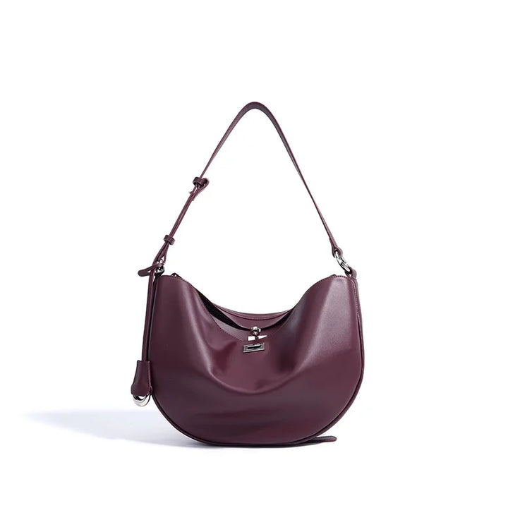 Sac à main polyvalent femme, en cuir vegan. Peut être porté épaule ou bandoulière. Luxe et élégant.