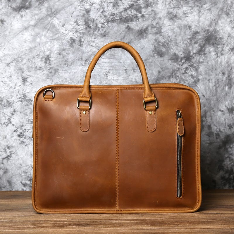 Sac à main en cuir de vache véritable pour homme, élégance masculine et fonctionnalité au quotidien.