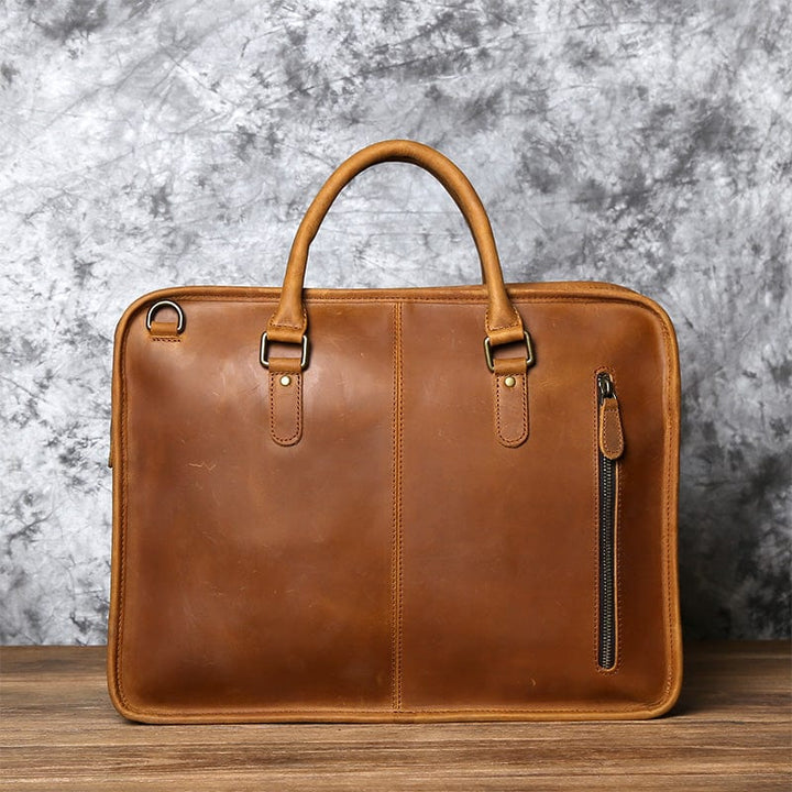 Sac à main en cuir de vache véritable pour homme, élégance masculine et fonctionnalité au quotidien.